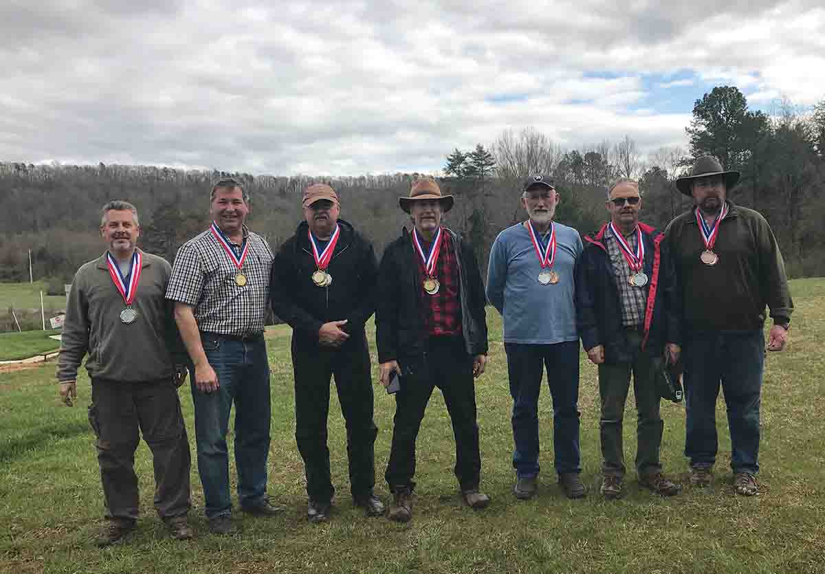 Top shooters of both matches (left to right): Al Roberts, Rick Weber, Ray Hopkins, Brent Danielson, Lee Shaver, Laurie Kerr, Art Fleener.